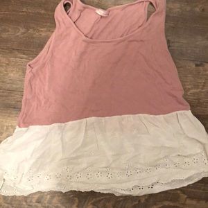 Off pink top with white embroidery at the bottom
